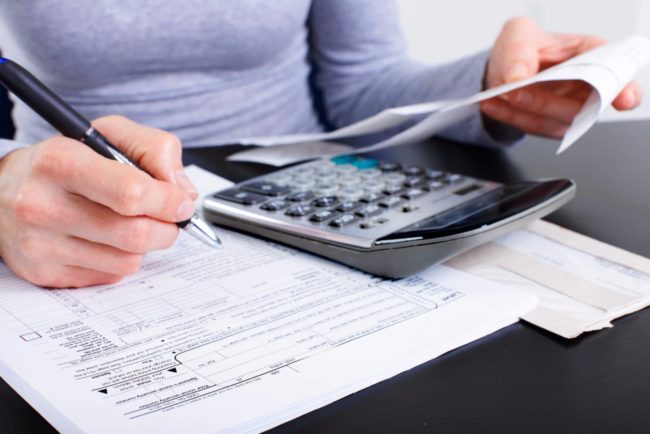 20160128204324-small-business-owner-tax-deductions-breaks-accountant-accounting-forms-receipts-irs-taxpayer